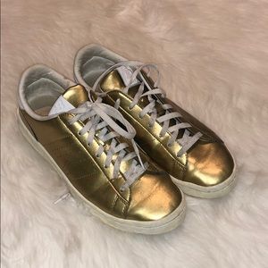 gold sneakers